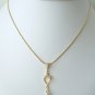 AB clear Swarovski Faceted Briolette with Gold Spade Connector Necklace