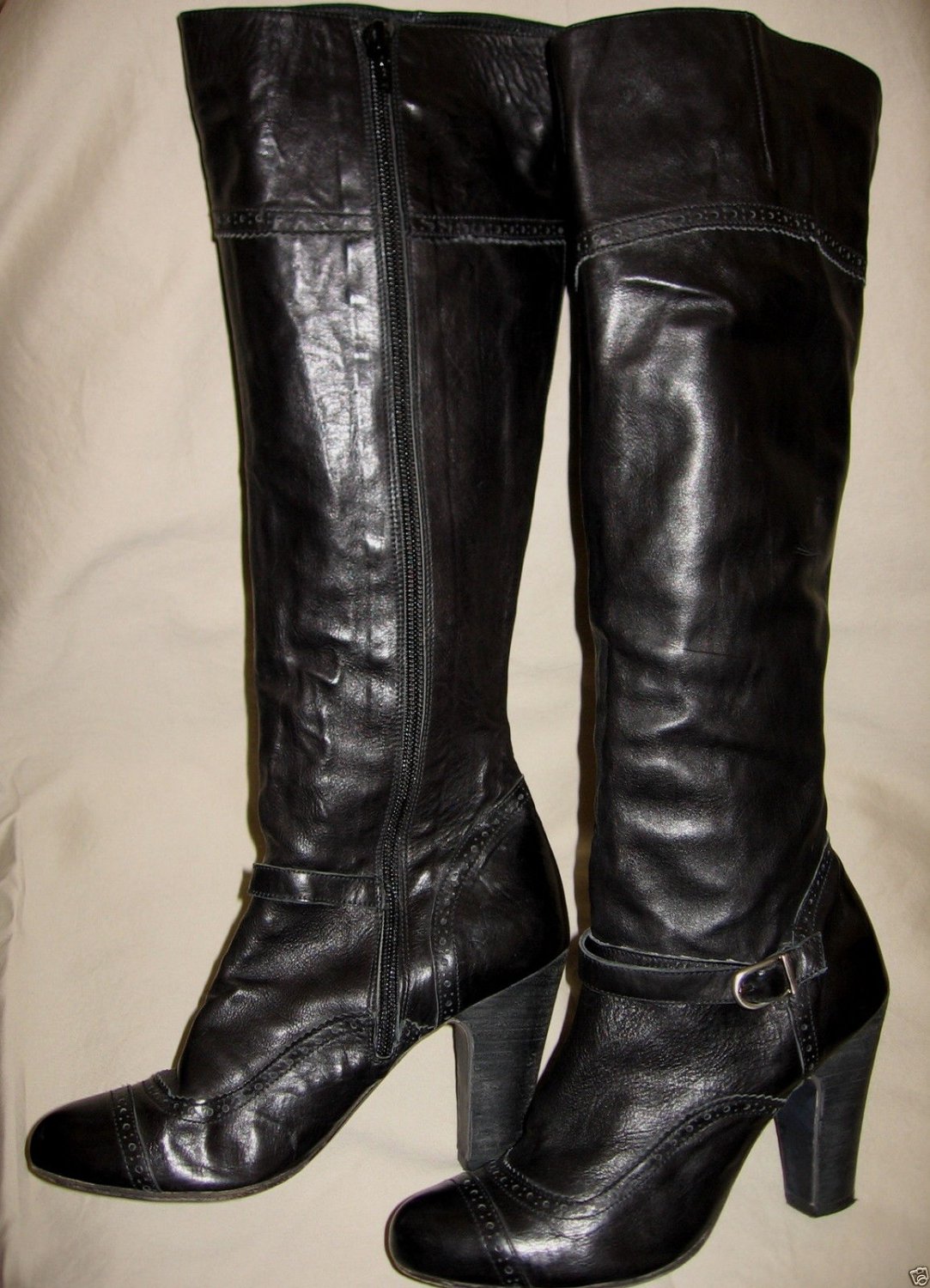 black leather mid heel knee high boots