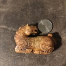 Jade figurine pendant