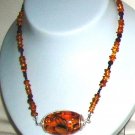 Amber necklace with garnet and pandent