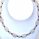 Rose quarts with black stone