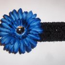Deep Blue Gerbera Daisy hair clip on a black 1.5 inch crochet headband