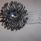 Zebra 4 inch gerbera daisy on a white 1.5 inch crochet headband