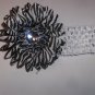 Zebra 4 inch gerbera daisy on a white 1.5 inch crochet headband
