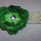 Green Peony Hairclip on a 1.5 inch cream crochet headband