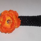 Orange peony hairclip on a 1.5 inch black headband