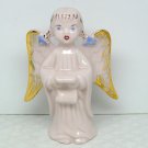 Vintage pink porcelain singing angel with pigtails figurine