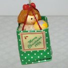 Vintage Enesco miniature Christmas Ornament 1986 Merry Christmas gift bag with doll and ball