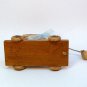 tan sitting bunny pull toy decoration hand carved wood artist signed 2001