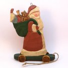 Santa pull toy Christmas ornament hand carved wood signed 1992