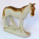 Vintage horse figurine on base made in Japan porcelain Vintage horse figurine on base made in Japan porcelain