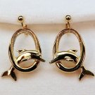 vtg Avon earrings clip dolphin rhinestone eye gold tone
