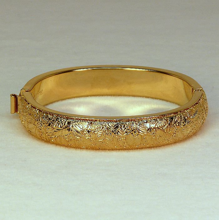 vtg Monet cuff bracelet hinged engraved leaves gold tone