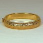 vtg Monet cuff bracelet hinged engraved leaves gold tone