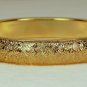 vtg Monet cuff bracelet hinged engraved leaves gold tone