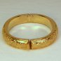 vtg Monet cuff bracelet hinged engraved leaves gold tone