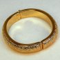 vtg Monet cuff bracelet hinged engraved leaves gold tone