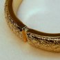 vtg Monet cuff bracelet hinged engraved leaves gold tone