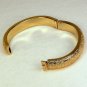 vtg Monet cuff bracelet hinged engraved leaves gold tone