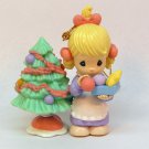 Enesco Precious Moments Christmas Ornament 1999 girl decorating the tree