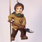 vintage boy shoveling Christmas ornament