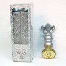 Gartner silver colored sealing wax and stamp initial D in script Gartner silver colored sealing wax and stamp initial D in script