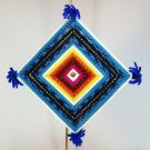 vintage Peruvian eye of God ornament fine details vintage Peruvian eye of God ornament fine details