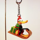 Daffy Duck on sled Christmas key ring chain Warner Bros Daffy Duck on sled Christmas key ring chain Warner Bros