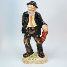 vintage figurine old man with umbrella glazed ceramic