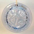pressed glass suncatcher lovers kissing SAG Inc 1996 light blue pressed glass suncatcher lovers kissing SAG Inc 1996 light blue