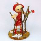 Vintage ornament girl in garden Christmas hand crafted on wood slice