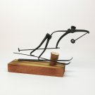 Vtg skiing nail sculpture metal 1970s humorous funny skier skis