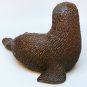 Red Mill Mfg seal figurine pecan shells dark brown