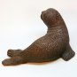 Red Mill Mfg seal figurine pecan shells dark brown
