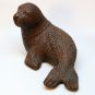 Red Mill Mfg seal figurine pecan shells dark brown