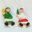 2 vtg Christmas ice skating ornaments wooden skaters Taiwan