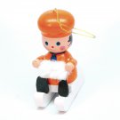 vtg girl on a sled w white muff ornament wooden Christmas Taiwan