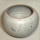 Pottery round bowl artist signed Winne light gray speckled