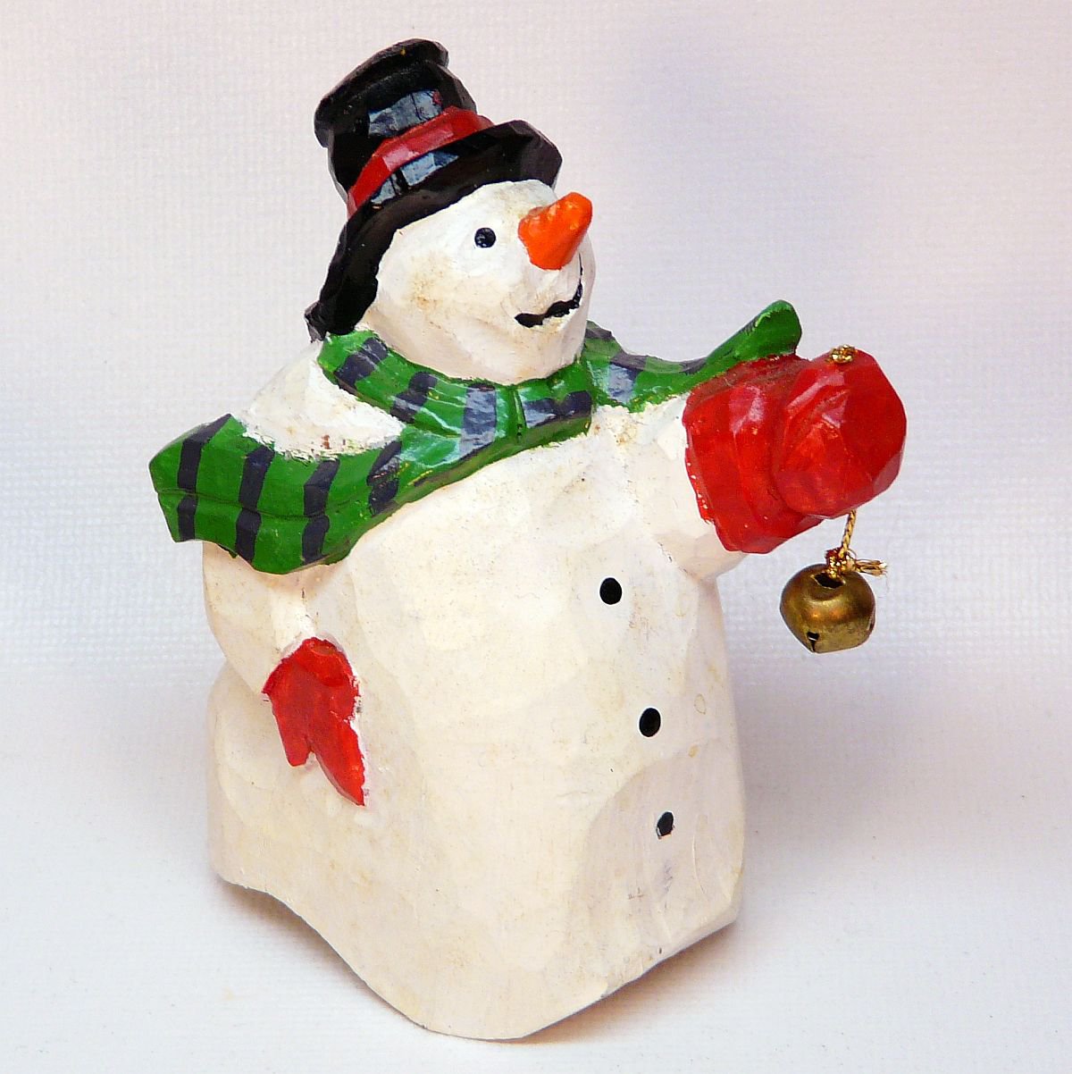 Vintage Dept 56 snowman holding a bell figurine