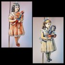 2 Victorian style Christmas ornaments laminated wood girls with dolls 2 Victorian style Christmas ornaments laminated wood girls with dolls