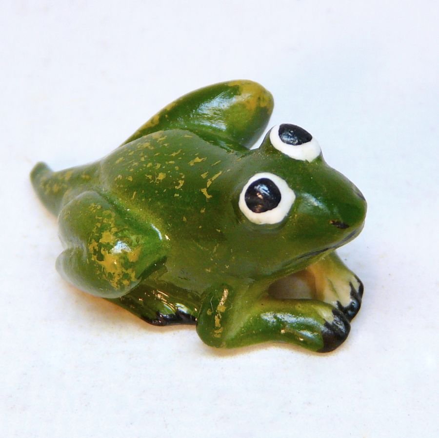 antique frog statuette