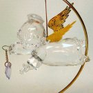 Clear acrylic angel Christmas ornament holding heart