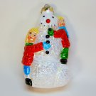 Large vintage blown glass snowman w children Christmas ornament