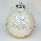 Blown glass Christmas ornament with glitter snowflakes Blown glass Christmas ornament with glitter snowflakes