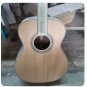 D&Atilde;&copy;couvrez la guitare acoustique OO Solid Top