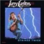 larry carlton - strikes twice CD 1988 MCA warner 8 tracks used like new