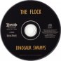 the flock - dinosaur swamps CD 1996 one way 7 tracks used like new A 26658