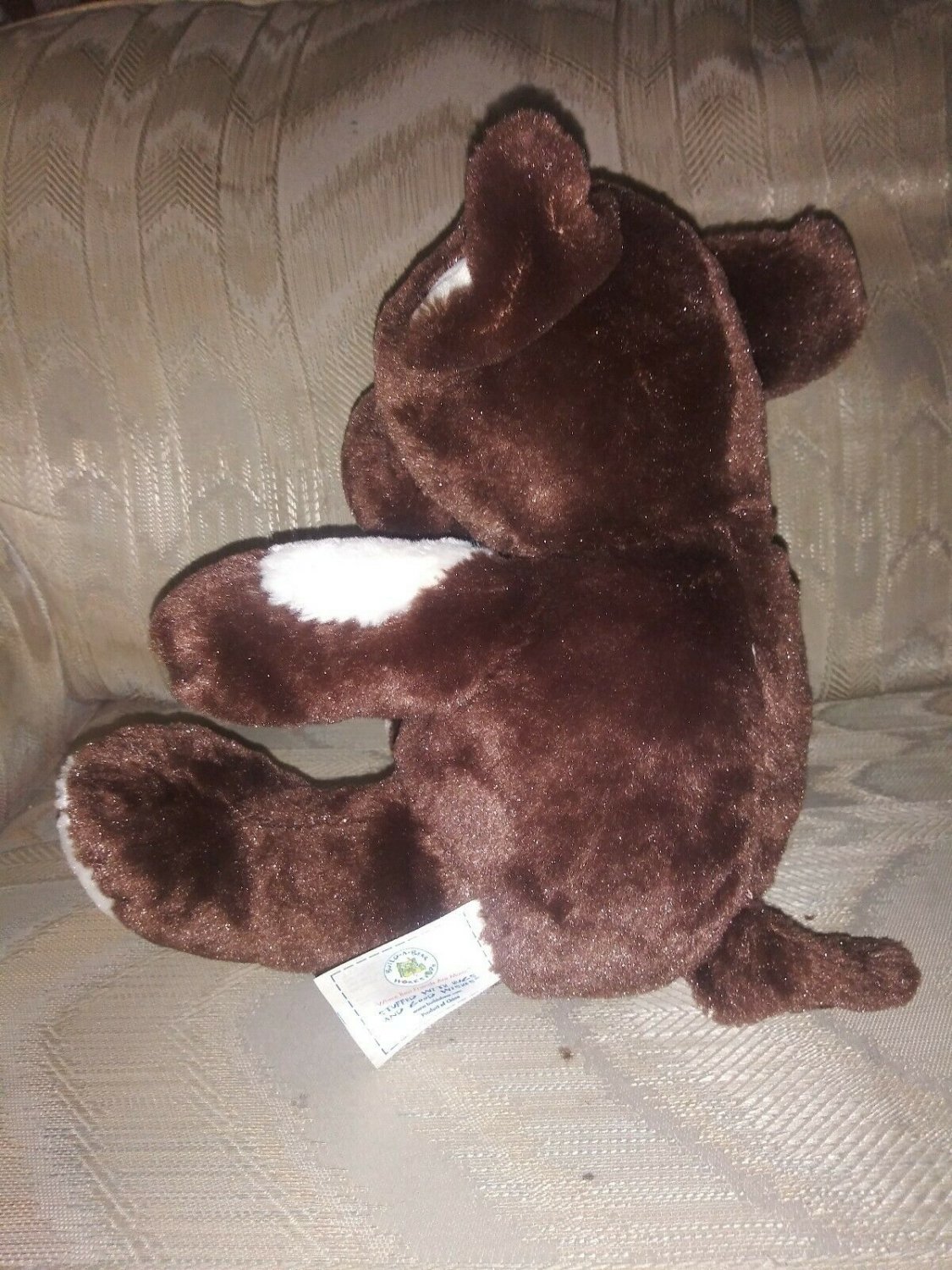 black and brown dog plush