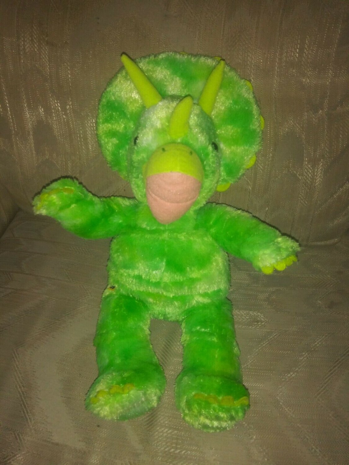 green stuffed triceratops