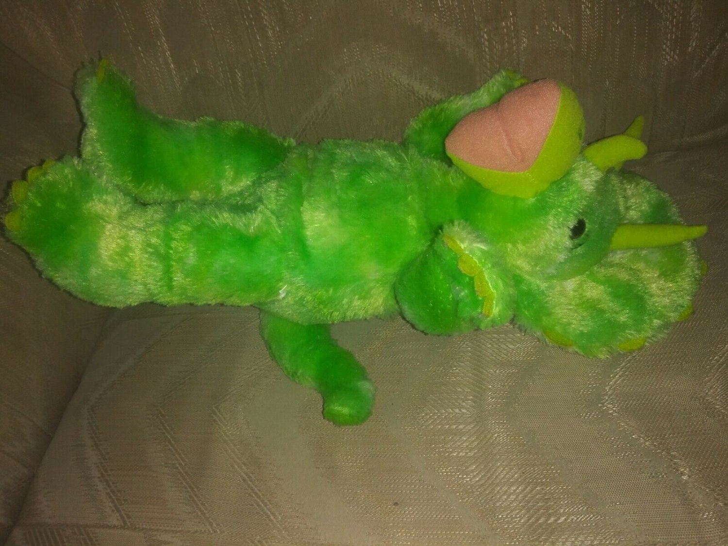 green stuffed triceratops